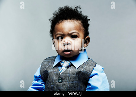 Portrait of baby boy wearing waistcoat, shirt and tie Stock Photo