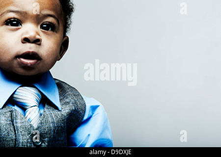 Portrait of baby boy wearing waistcoat, shirt and tie Stock Photo
