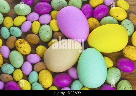 Large and small different colour chocolate Easter eggs. Stock Photo