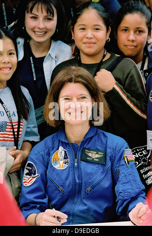 NASA astronaut Sally Ride, America's first woman in space poses with students October 6, 2010. Sally Ride became the first American woman to fly in space on June 18, 1983 aboard the shuttle Challenger. Stock Photo