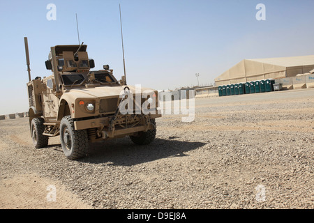 An Oshkosh M-ATV sits parked at Camp Leatherneck, Afghanistan. Stock Photo