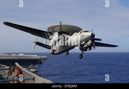 An E-2C Hawkeye launches from USS Kitty Hawk. Stock Photo