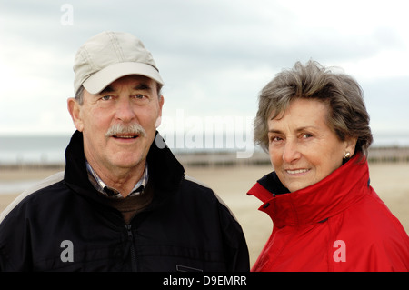 Senior citizen's pair, happily and in love, in autumnal clothes.  (Model release) Stock Photo