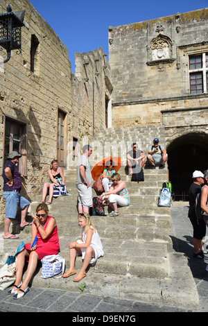 Rhoades Steps Old travelers are sitting on the steps of a long staircase. A long ...