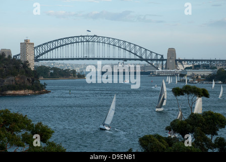 Sydney Harbour Bridge with yachts sailing on the harbour Stock Photo