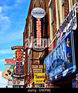 Neon signs of bars on Broadway in Nashville, Tennessee. Stock Photo