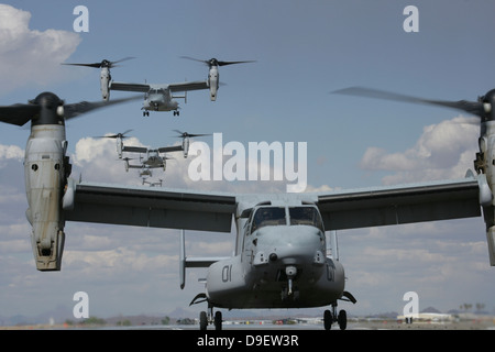 U.S. Marine Corps MV-22 Osprey tiltrotor aircraft prepare for landing.