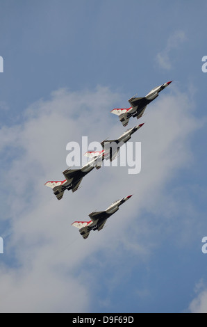 The United States Air Force Thunderbirds demonstration squadron fly in formation over Lakeland, Florida. Stock Photo