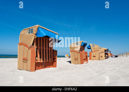 Beach baskets on a beach on the Baltic Sea Beach chairs on a beach on the Baltic Sea Stock Photo