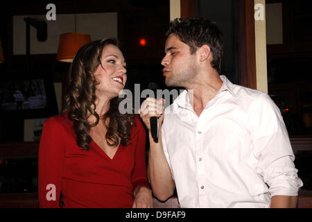 Laura Osnes and Jeremy Jordan  Henry's restaurant owner Henry Rinehart and Jeff Calhoun hosts Broadway Watches the Oscars, a special evening where the Broadway community watches the Oscar broadcast, dines, drinks and celebrates in song, held at Henry's restaurant on Broadway and 105th Street   New York City, USA - 27.02.11 Stock Photo