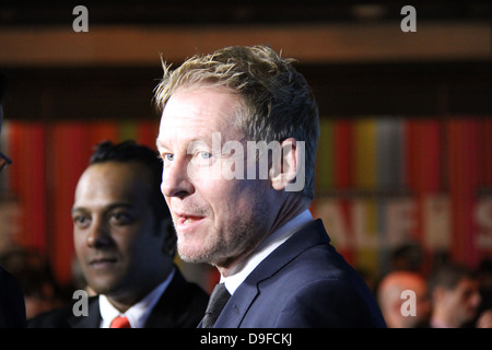 Pictured are Sydney Film Festival Director Nashen Moodley (L) and Australian actor Richard Roxburgh (R) on the red carpet. Stock Photo