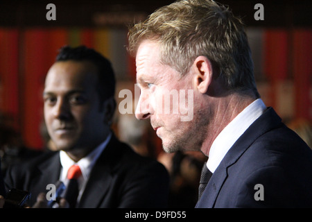 Pictured are Sydney Film Festival Director Nashen Moodley (L) and Australian actor Richard Roxburgh (R) on the red carpet. Stock Photo