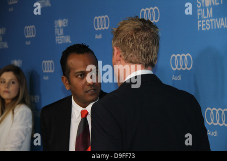 Pictured are Sydney Film Festival Director Nashen Moodley (L) and Australian actor Richard Roxburgh (R) on the red carpet. Stock Photo