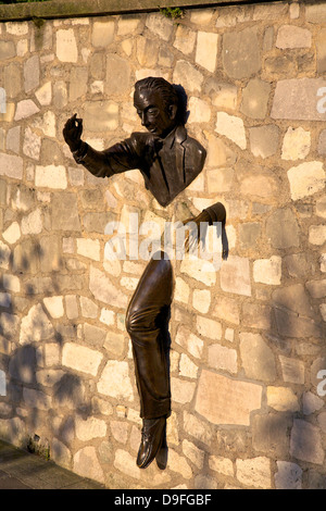 Sculpture of Le Passe Muraille (The Passer Through Walls)  by Jean Marais, Montmartre, Paris, France Stock Photo