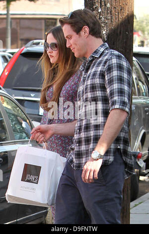 Heavily pregnant Devon Aoki and her fiance James Bailey leaving Joans on Third in West Hollywood. Los Angeles, California - 05.03.11 Stock Photo