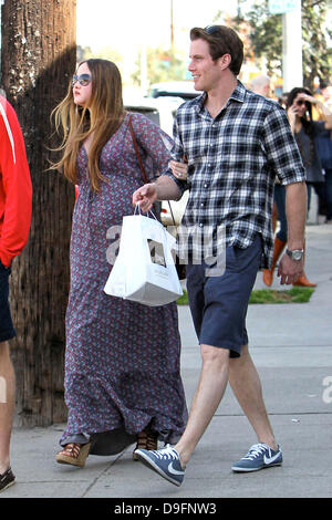 Heavily pregnant Devon Aoki and her fiance James Bailey leaving Joans on Third in West Hollywood. Los Angeles, California - 05.03.11 Stock Photo