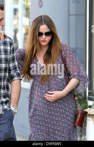 Heavily pregnant Devon Aoki and her fiance James Bailey leaving Joans on Third in West Hollywood. Los Angeles, California - 05.03.11 Stock Photo