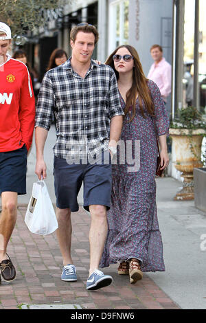 Heavily pregnant Devon Aoki and her fiance James Bailey leaving Joans on Third in West Hollywood. Los Angeles, California - 05.03.11 Stock Photo