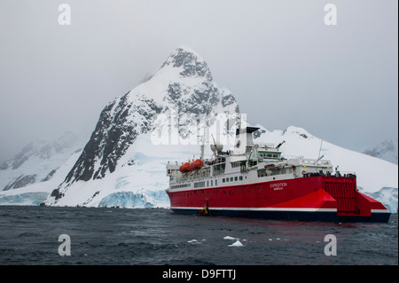 Cruise ship in the Lemaire Channel, Antarctica, Polar Regions Stock Photo