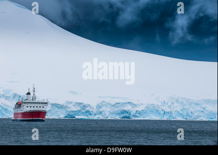 Cruise ship in the glaciers and icebergs, Port Lockroy research station, Antarctica, Polar Regions