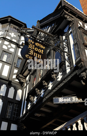 The half-timbered facade of Ye Olde Boot Inn, dating from 1643, a traditional British pub, in Chester, Cheshire, England, UK Stock Photo