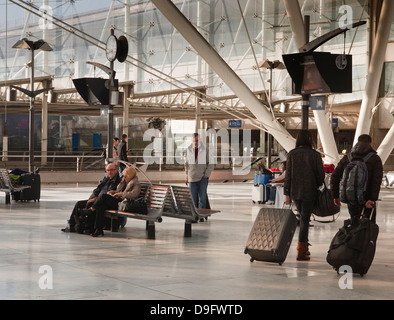 Passengers inside the TGV station at Charles de Gaulle, Paris, France Stock Photo