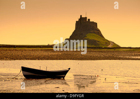 Lindisfarne castle, Northumberland, England, UK. View with golden light Stock Photo