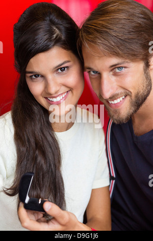 Man proposing his girlfriend in a restaurant Stock Photo