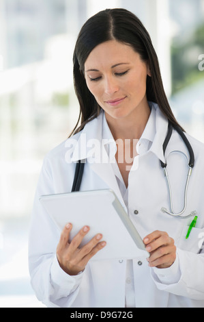 Female doctor using a digital tablet Stock Photo