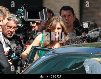 Elizabeth Hurley wearing a form fitting teal dress is seen shooting scenes for the new TV movie ' Wonder Woman' as the villain Veronica Cale  Los Angeles, California - 15.03.11 Stock Photo