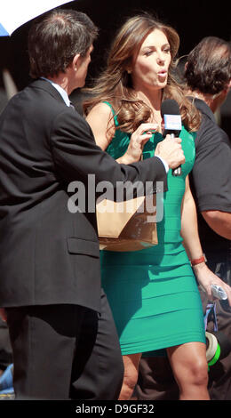 Elizabeth Hurley wearing a form fitting teal dress is seen shooting scenes for the new TV movie ' Wonder Woman' as the villain Veronica Cale  Los Angeles, California - 15.03.11 Stock Photo