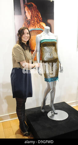 Charlotte Todd with her dress design as worn by Kate Middleton during a fashion show at St Andrews University in 2002.  The dress is going up for sale at Kerry Taylor auctions with an estimate of £8,000-10,000. London, England - 16.03.11 Stock Photo