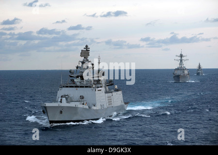 The Indian Navy frigate INS Satpura is underway with U.S. Navy ships. Stock Photo