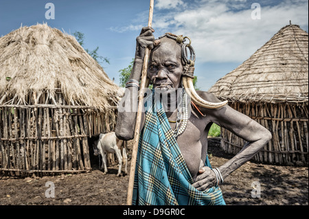 Portrait of an old Mursi woman with typical ornaments, Omo valley, Ethiopia Stock Photo