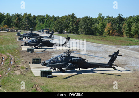 An air crew starts their AH-64D Apache helicopters at Fort Campbell Stock Photo