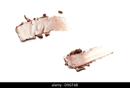 pinky gold shimmer eyeshadow smear cut out onto a white background Stock Photo