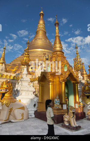 Sunday scene within the Schwedagon pagoda complex in Rangoon(Yangon) in Burma (Myanmar). Stock Photo