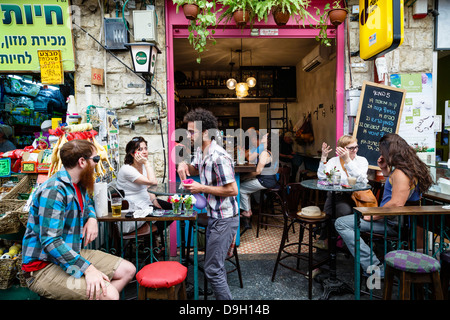 People sitting at a Cafe in Mahane Yehuda market, Jerusalem, Israel. Stock Photo