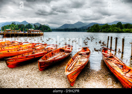 wooden rowing boats on Derwent Water in the Lake District, Cumbria, England in the town of Keswick Stock Photo