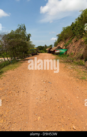 Typical dusty Country Road in the Kampot Province, Cambodia Stock Photo