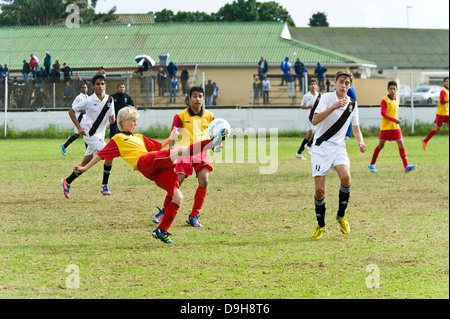 U15 Junior football teams playing a league match, Cape Town, South Africa Stock Photo