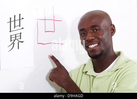 male African student learning Chinese Stock Photo