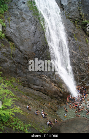 Palaruvi Waterfall at Kerala India and the Aerial Scenery View of Peoples Enjoying bathing at Water Fall Stock Photo