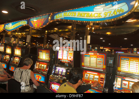 Las Vegas Nevada,The Strip,South Las Vegas Boulevard,Circus Circus Hotel Casino,slot machine,machines,gamble,gambling,gamblers,luck,NV130328018 Stock Photo