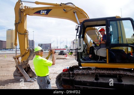 Las Vegas Nevada,Dig This,hands-on bulldozer construction site,Caterpillar 315C hydraulic excavator teacher teaching how to taking photo Stock Photo