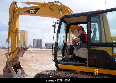 Las Vegas Nevada,Dig This,hands on,hands-on,bulldozer,excavator,under new construction site building builder,equipment,orientation,Caterpillar 315C hy Stock Photo