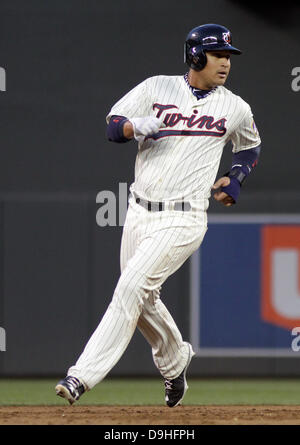 Minneapolis, Mn, USA 19th June, 2013. June 19, 2013: Minnesota Twins left fielder Oswaldo Arcia (31) holds up after rounding second base during the Major League Baseball game between the Minnesota Twins and the Chicago White Sox at Target Field in Minneapolis, Minn. Credit: csm/Alamy Live News Stock Photo