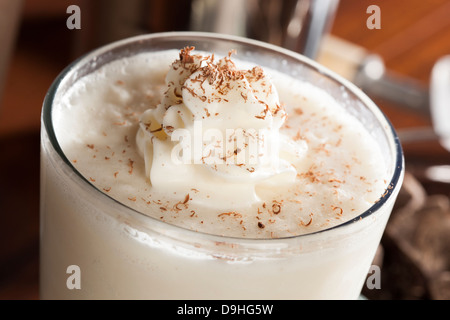 Rich and Creamy Milkshake with whipped cream Stock Photo