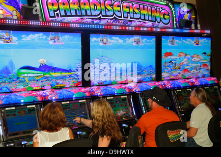 Las Vegas Nevada,Downtown,Plaza Hotel & Casino,slot machine,machines,gamble,gambling,gamblers,adult adults man men male,woman women female lady,visito Stock Photo