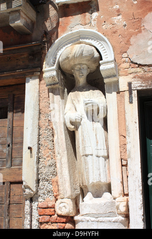 Statue at Tintoretto's house near Campo dei Mori, Cannaregio area. Stock Photo